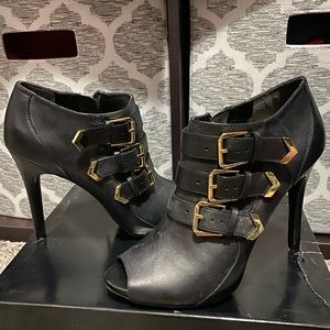 Brand new never worn BCBG black peep toe heeled booties